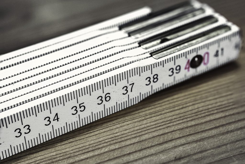 A picture of a folding ruler, which I'm using as a metaphor for surveys as a measurement tool